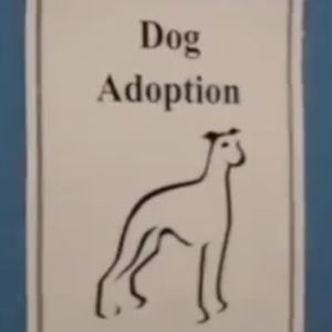 A sign with a drawn image of a dog reads Dog Adoption