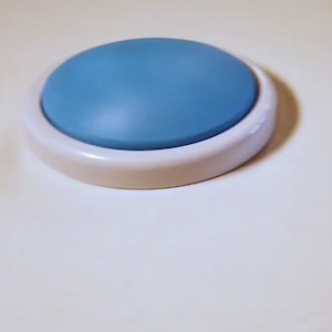 A close shot of a large button