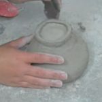Learn how to build a pinch pot, step by step.
