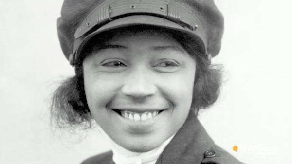 Woman's face with pilot's goggles